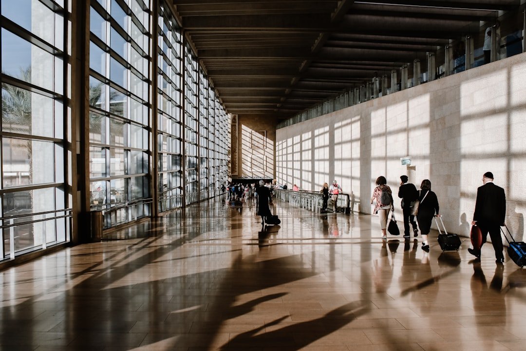 Family with kids ready to travel at the airport
