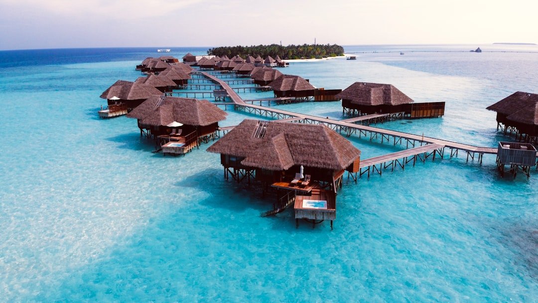 Maldives overwater bungalow turquoise