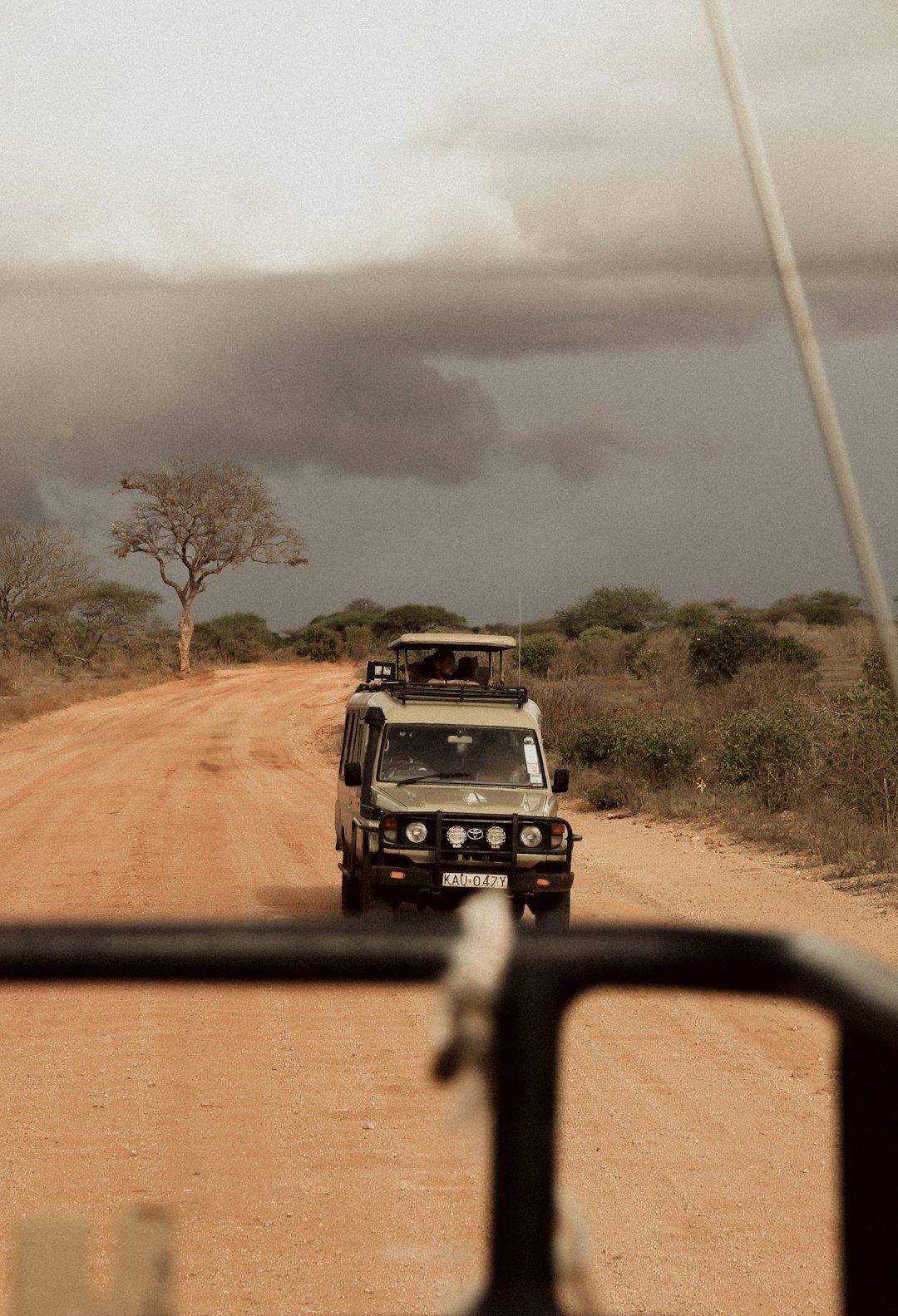 Safari jeep game drive in Kenya's savanna
