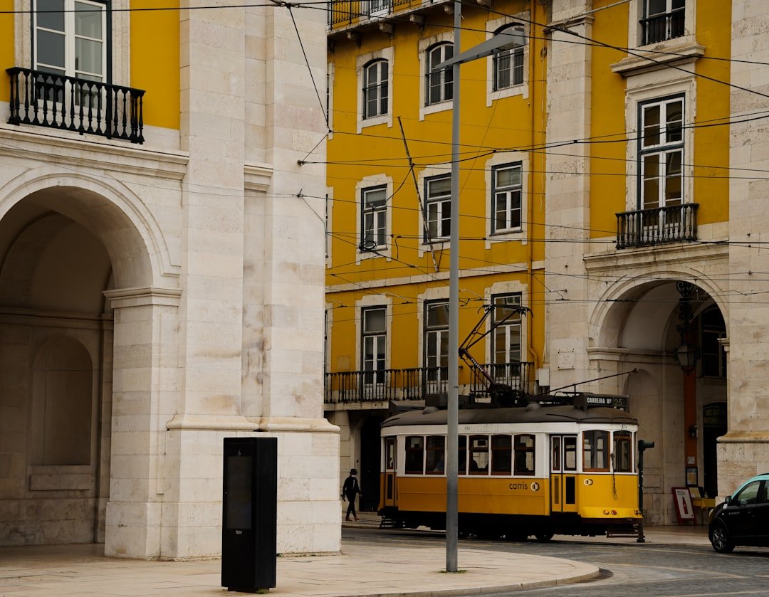 Yellow tram on the hills of Lisbon Portugal