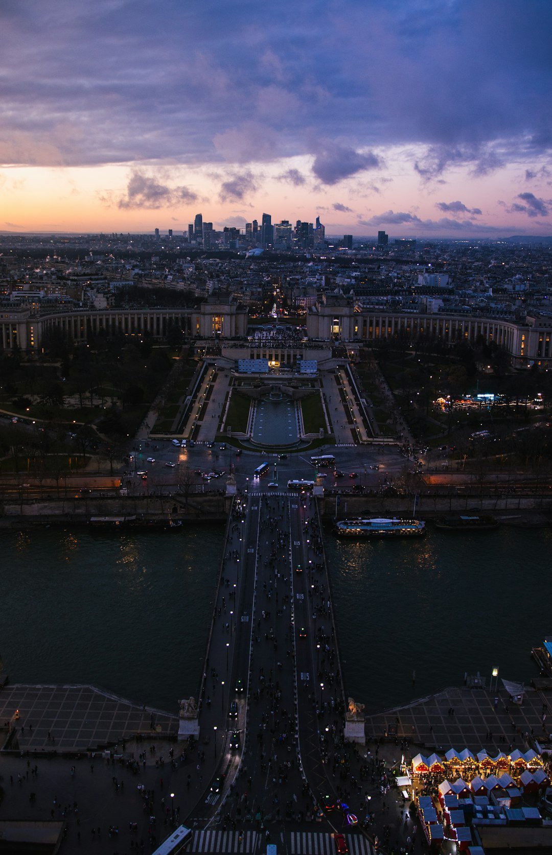 Paris Seine river bridge illuminated at night