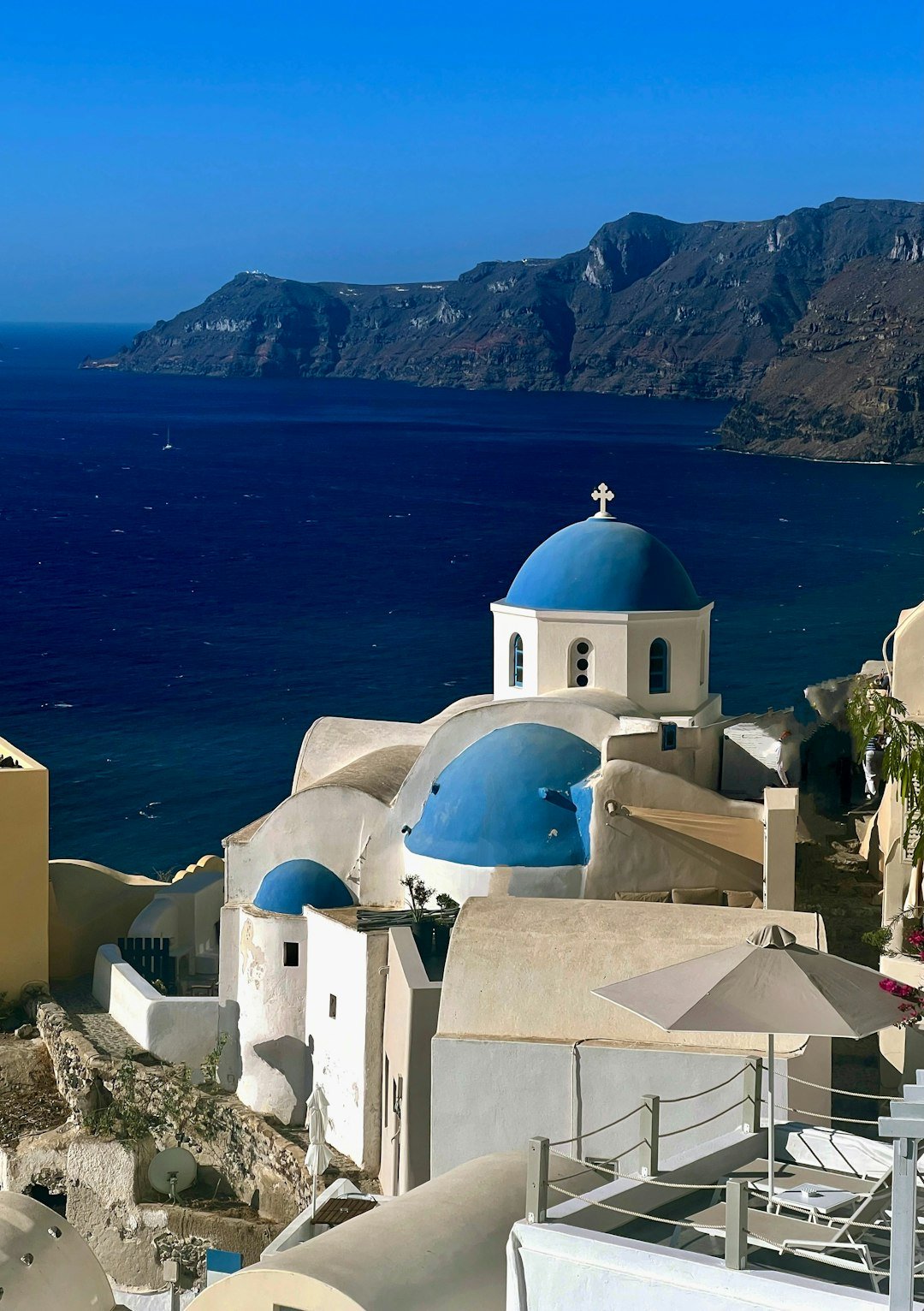 Oia village on the cliffside above the caldera in Santorini