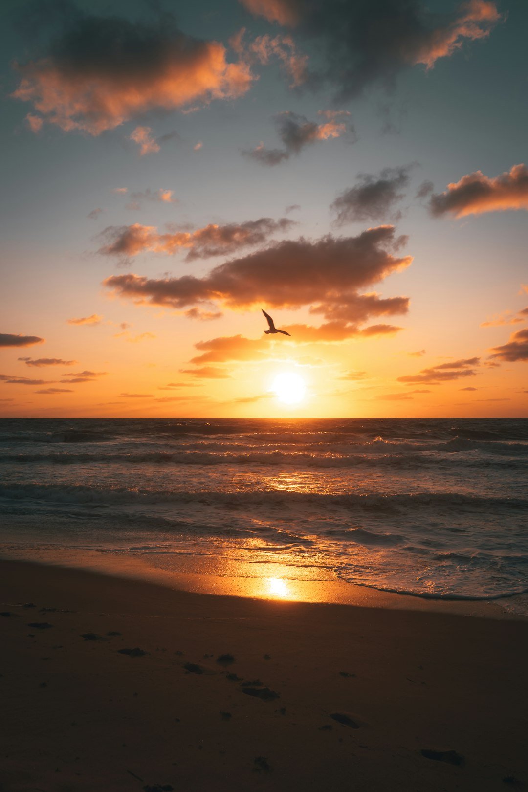 Romantic tropical beach sunset over the ocean