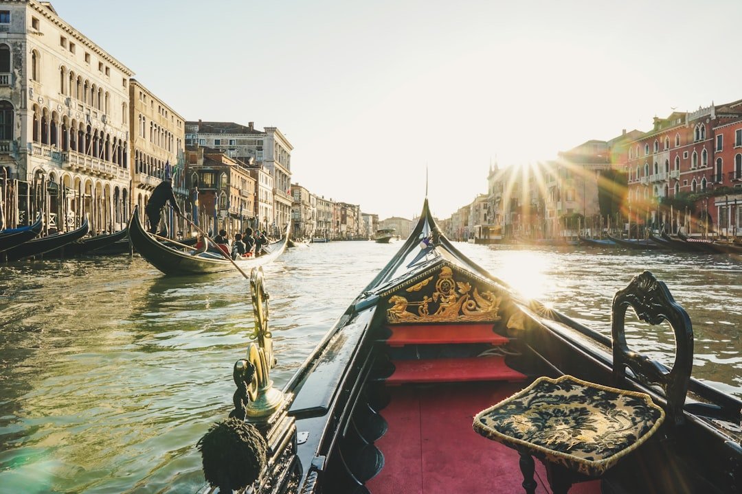 A gondola drifting along the canals of Venice Italy