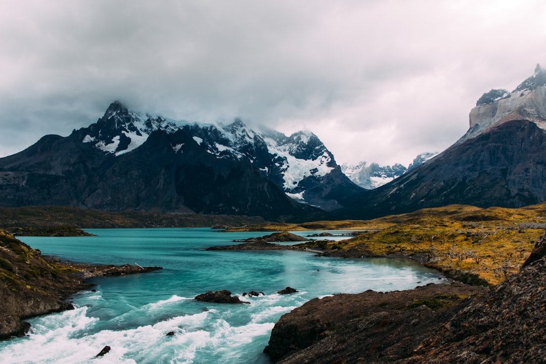 Torres del Paine granite towers rising over a turquoise lake in Patagonia