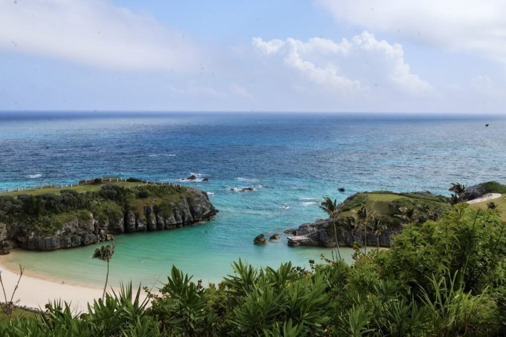 Turquoise bay with white sand and blue ocean