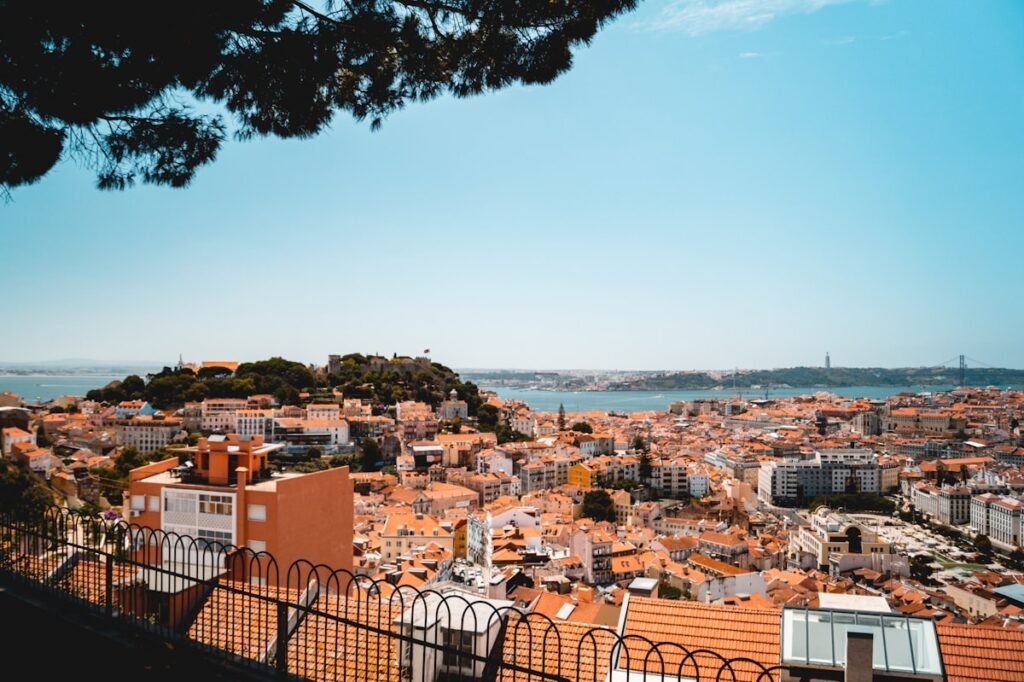 Pastel houses above the water in Portugal